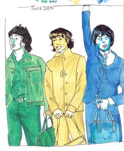 Three young men in matching 1960s outfits holding travel bags, each in one color: a green denim jacket, a yellow coat, and a blue suit, arm raised.